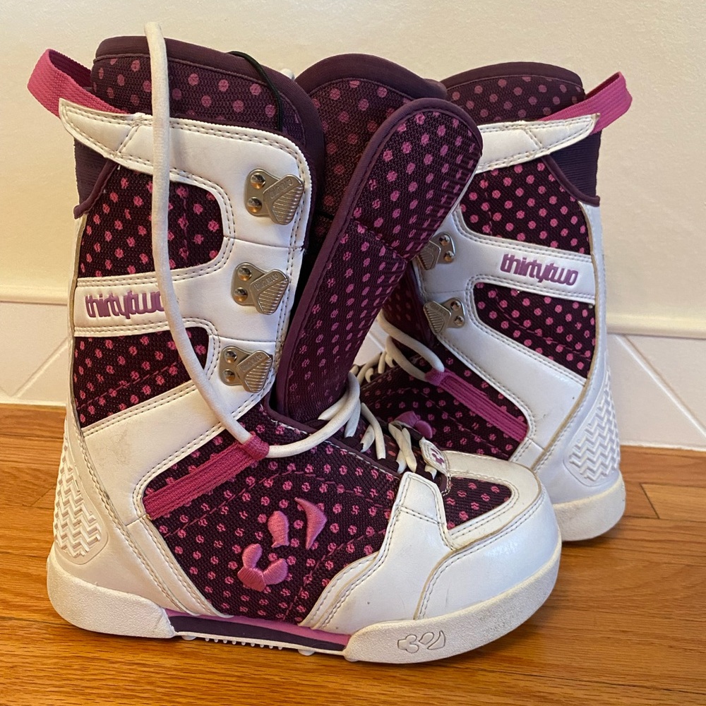Purple with pink polka dot Thirtytwo snowboarding boots.